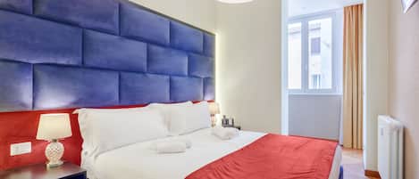 Familienapartment, Balkon | 1 Schlafzimmer, Zimmersafe, individuell eingerichtet, Schreibtisch