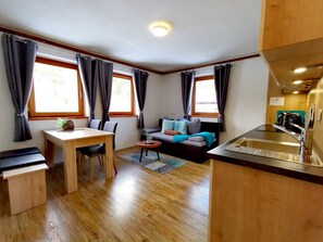 Comfort Apartment, Mountain View, Mountainside (Kitzbühler Horn) | Living area | Flat-screen TV - Haus Dirol (Kirchberg in Tirol)