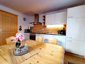 Comfort Apartment, 3 Bedrooms, Mountain View, Ground Floor (Fleckalm) | Private kitchen | Full-sized fridge, microwave, oven, stovetop