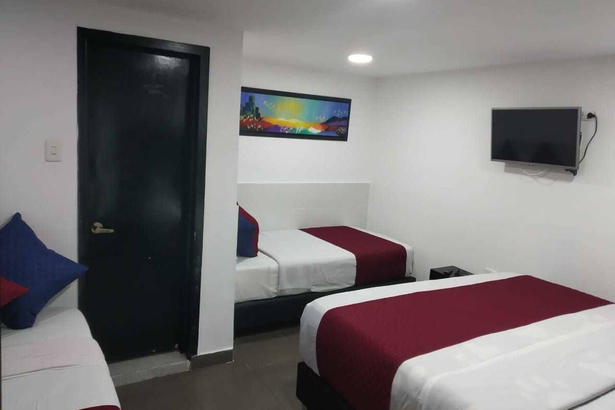 Quadruple Room | Blackout drapes, iron/ironing board (on request), WiFi (free)