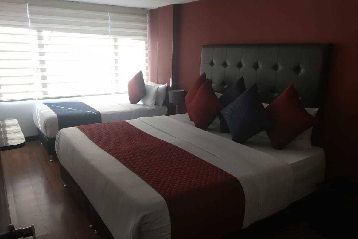 Triple Room | Blackout drapes, iron/ironing board (on request), WiFi (free)