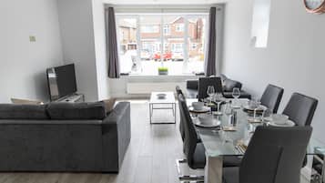 Apartment, 3 Bedrooms | Living area | Flat-screen TV