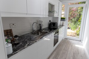 Apartament, 1 dormitori, planta baixa | Cuina privada | Frigorífic gran, microones, forn i placa de cuina