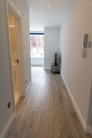 Apartament, 1 dormitori, planta baixa | Sala d'estar | Televisor de pantalla plana