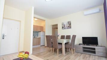 Apartment, 2 Bedrooms | Living area | Flat-screen TV