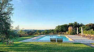 Seasonal outdoor pool, open 8:30 AM to 10:00 PM, sun loungers