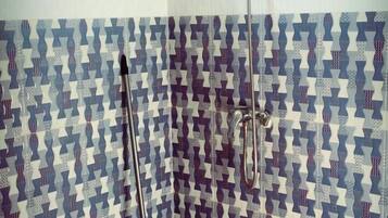 Basic Triple Room | Bathroom | Shower, rainfall showerhead, towels, soap