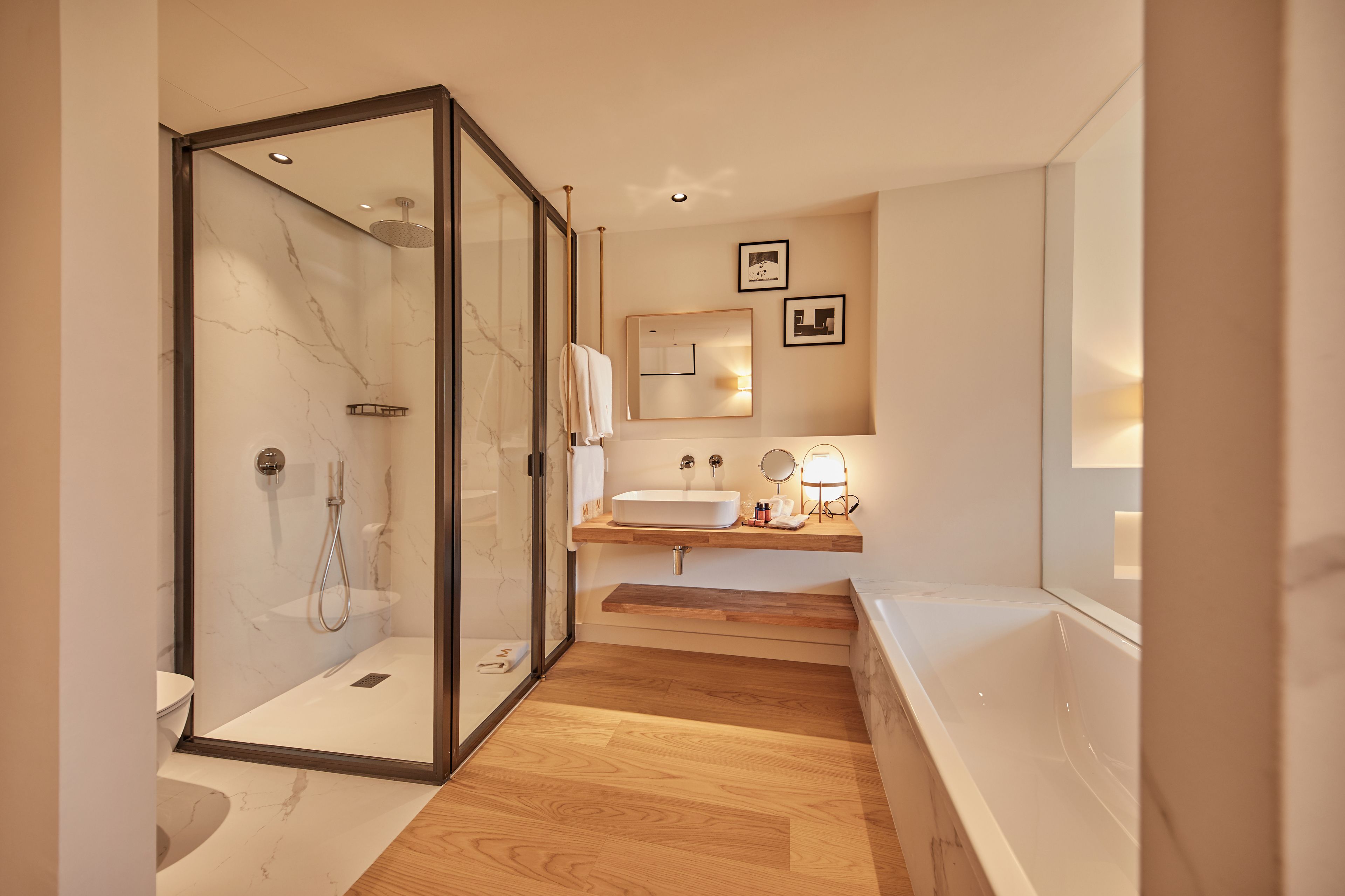 deluxe double room | bathroom | hair dryer, bathrobes, slippers, towels