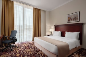 Suite | In-room safe, desk, laptop workspace, iron/ironing board