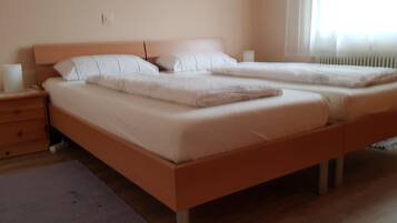 2 bedrooms, premium bedding, blackout curtains, iron/ironing board