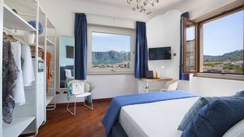 1 dormitorio, tabla de planchar con plancha, cunas (de pago)