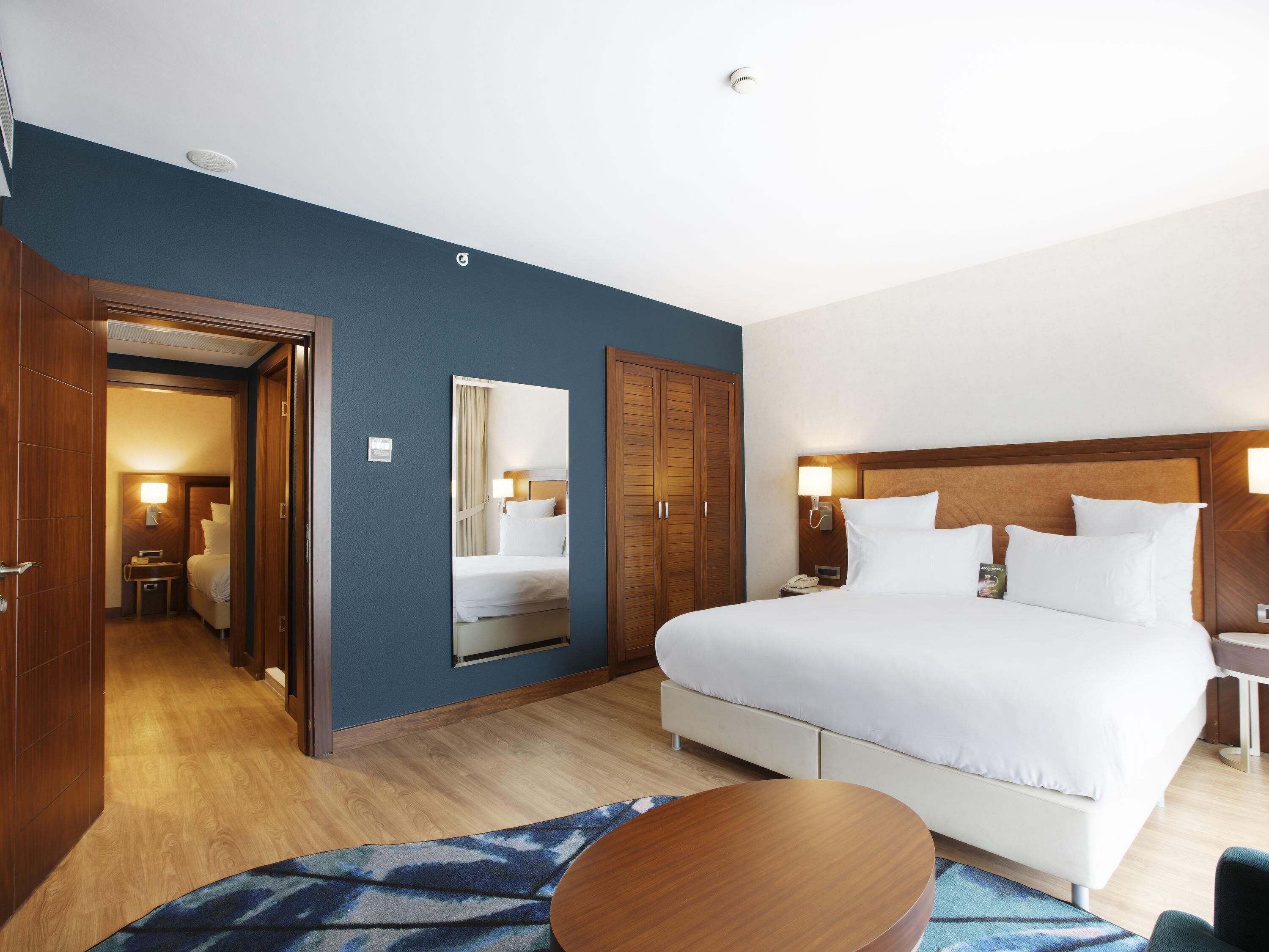 Family Suite, Multiple Beds | In-room safe, desk, laptop workspace, blackout drapes