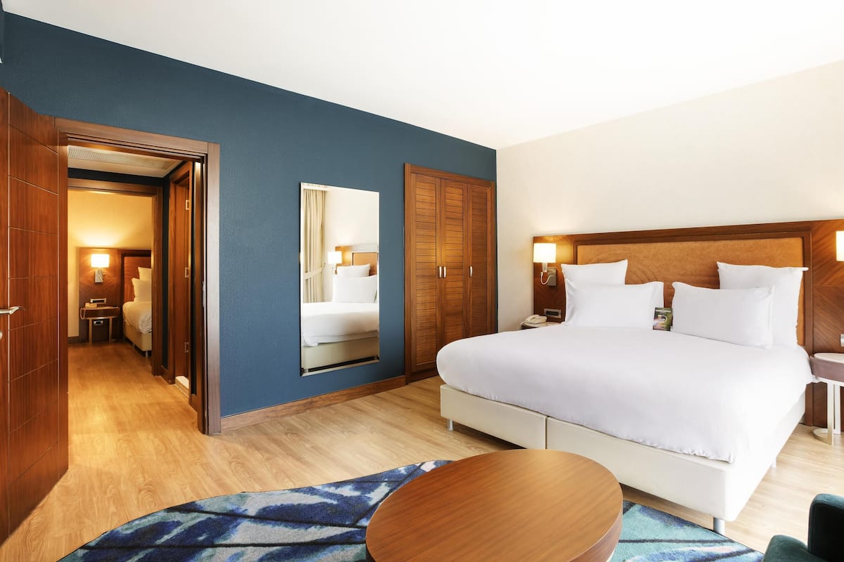 Family Suite, Multiple Beds | Minibar, in-room safe, desk, laptop workspace