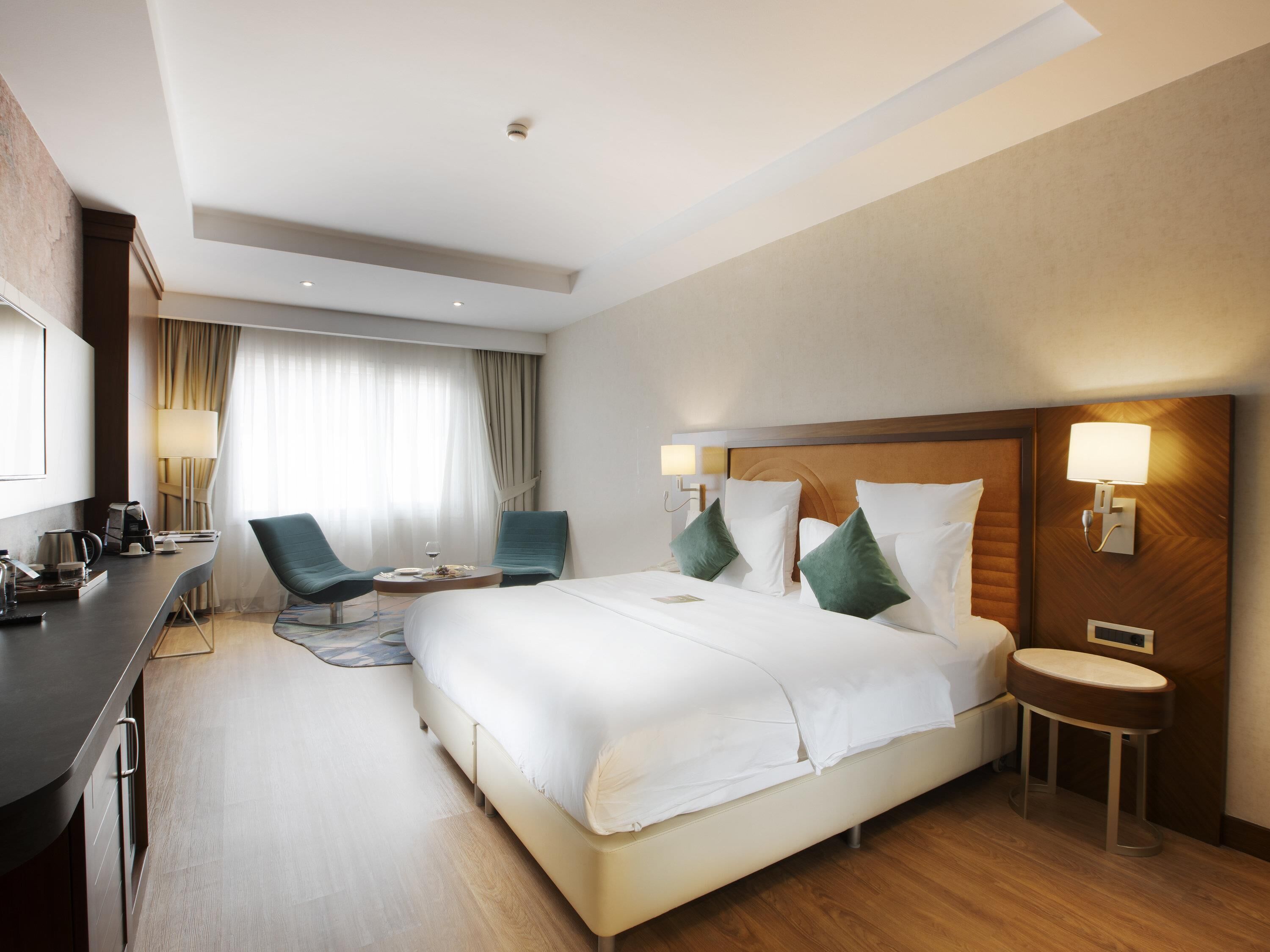 Junior Suite, 1 Double Bed with Sofa bed | In-room safe, desk, laptop workspace, blackout drapes