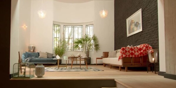 Apartment, Non Smoking | Living area | Flat-screen TV