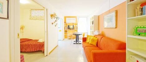 Apartment, 1 Bedroom | Living area | Flat-screen TV