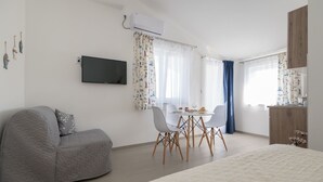 Studio, Sea View (More) | Living area | Flat-screen TV - Apartments Livaja (Kastela)