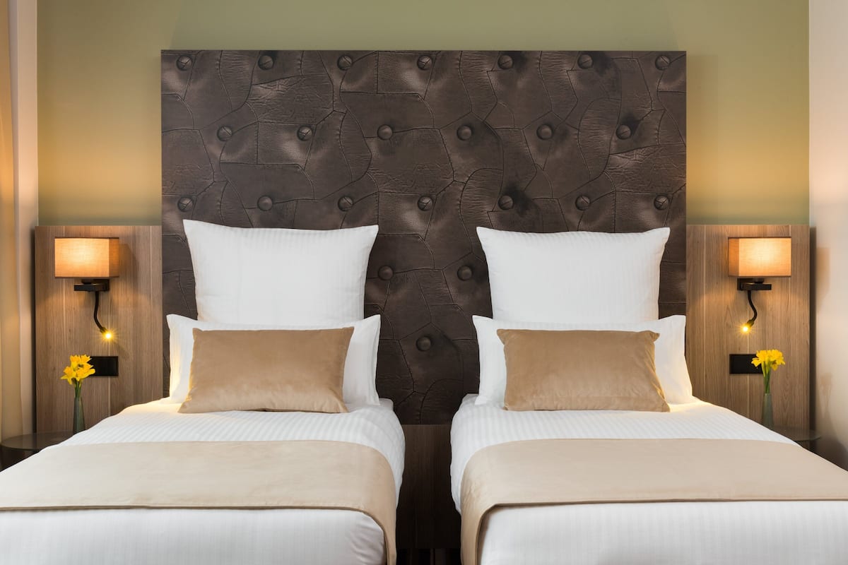 comfort room | 1 bedroom, minibar, in-room safe, desk