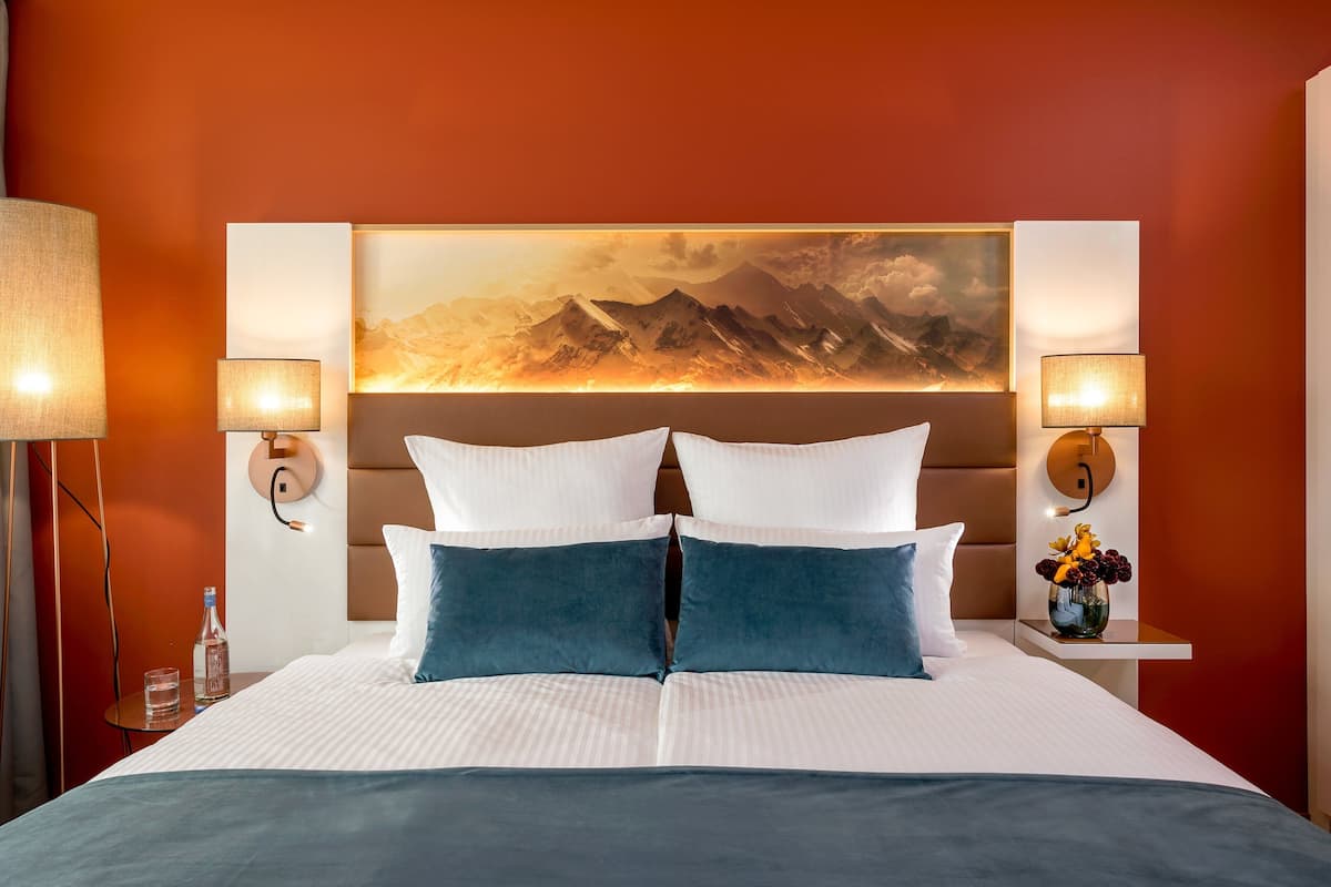 comfort room | 1 bedroom, minibar, in-room safe, desk