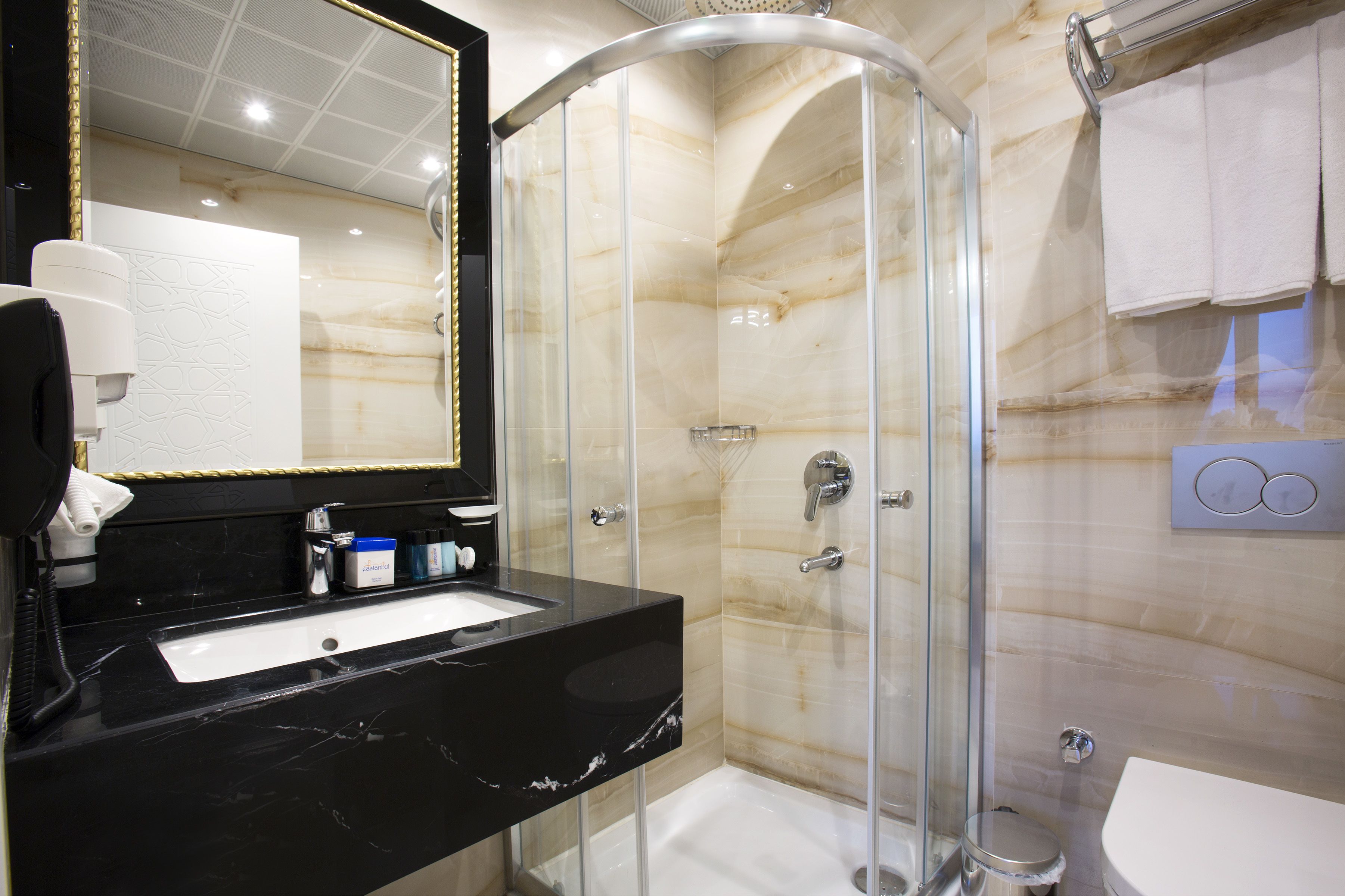 shower, hair dryer, bathrobes, slippers