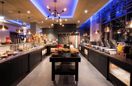 Daily buffet breakfast for a fee. Leonardo Hotel Eschborn Frankfurt