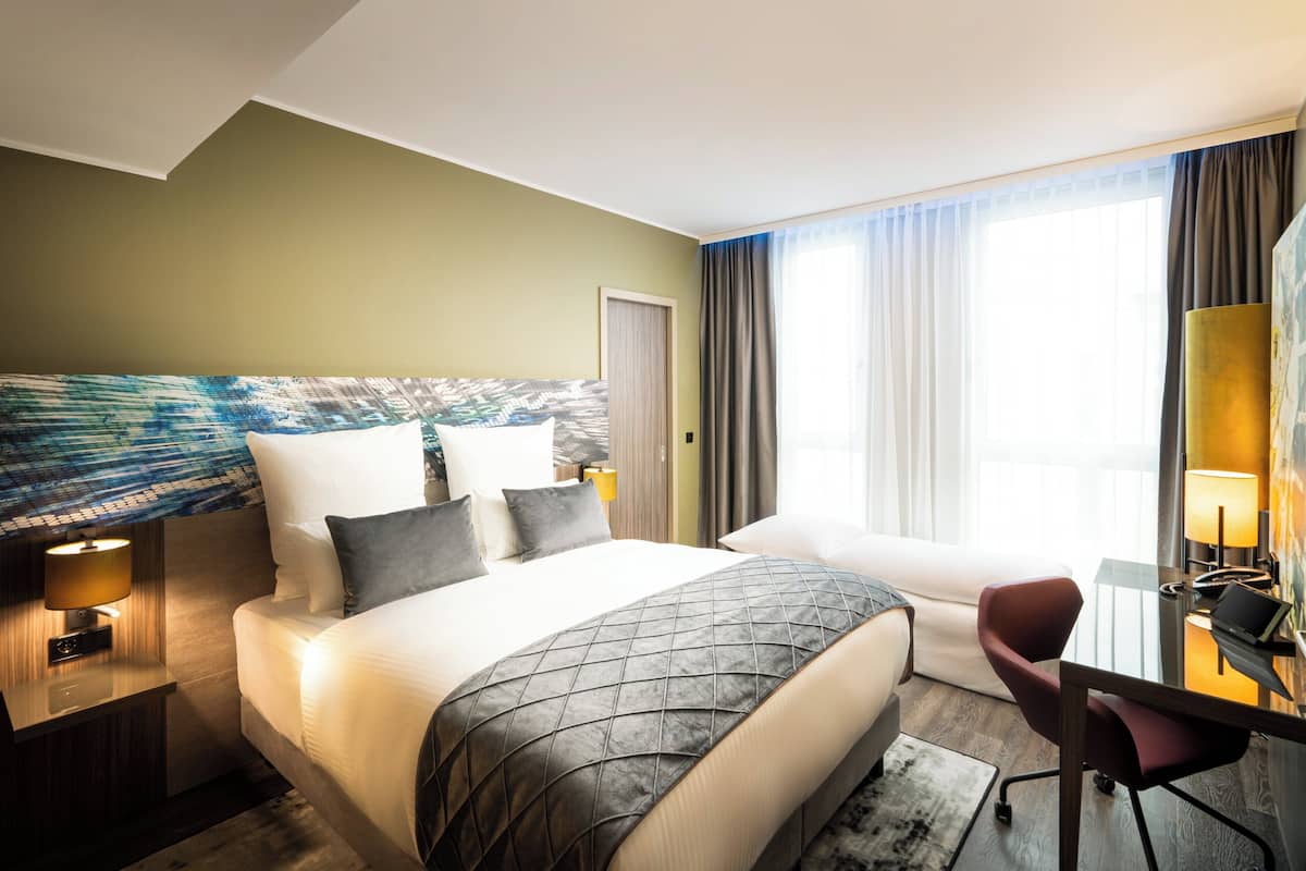 Superior Triple Room | In-room safe, desk, laptop workspace, blackout drapes