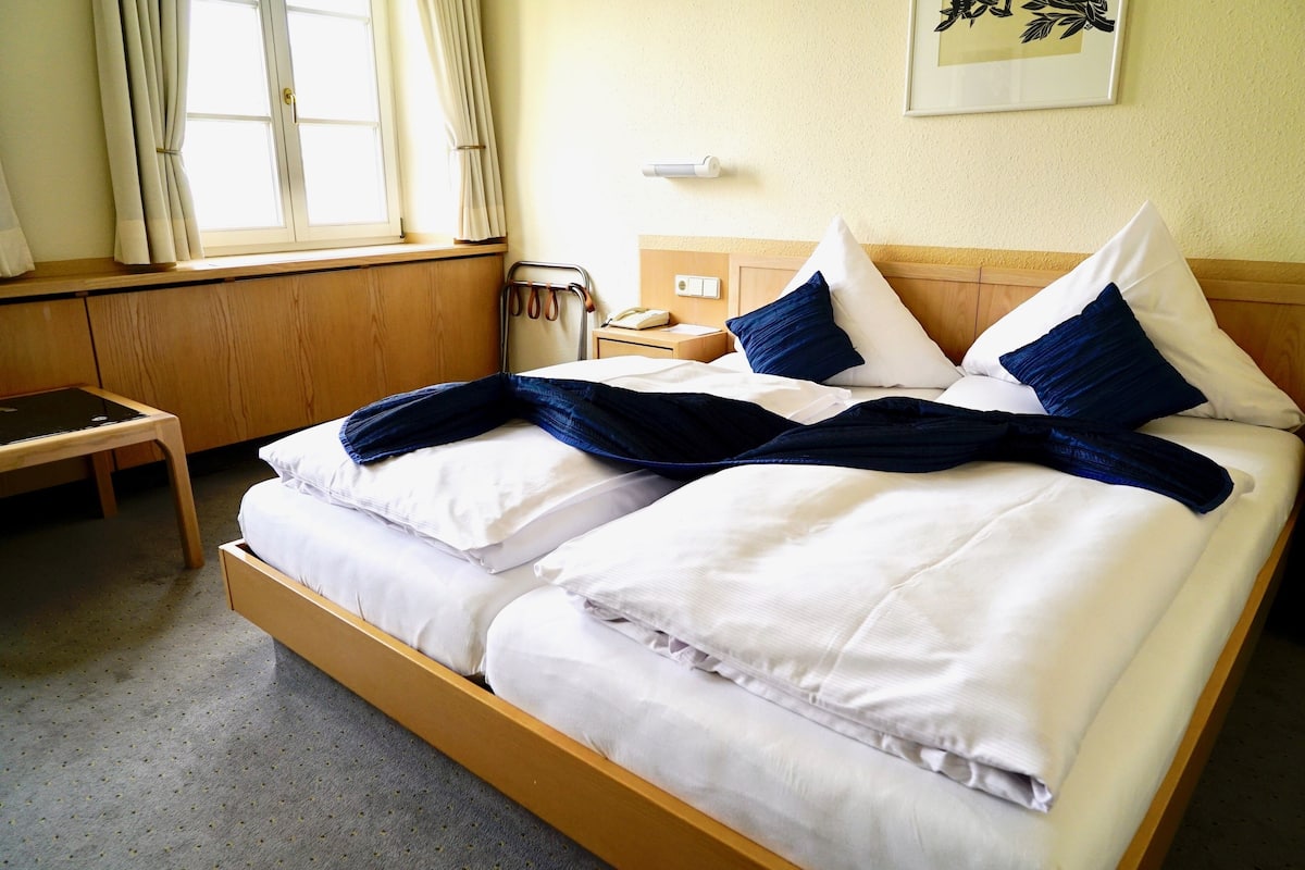 desk, laptop workspace, blackout curtains, iron/ironing board