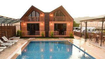 Exclusive Bungalow, Jetted Tub | 1 bedroom, hypo-allergenic bedding, desk, blackout drapes