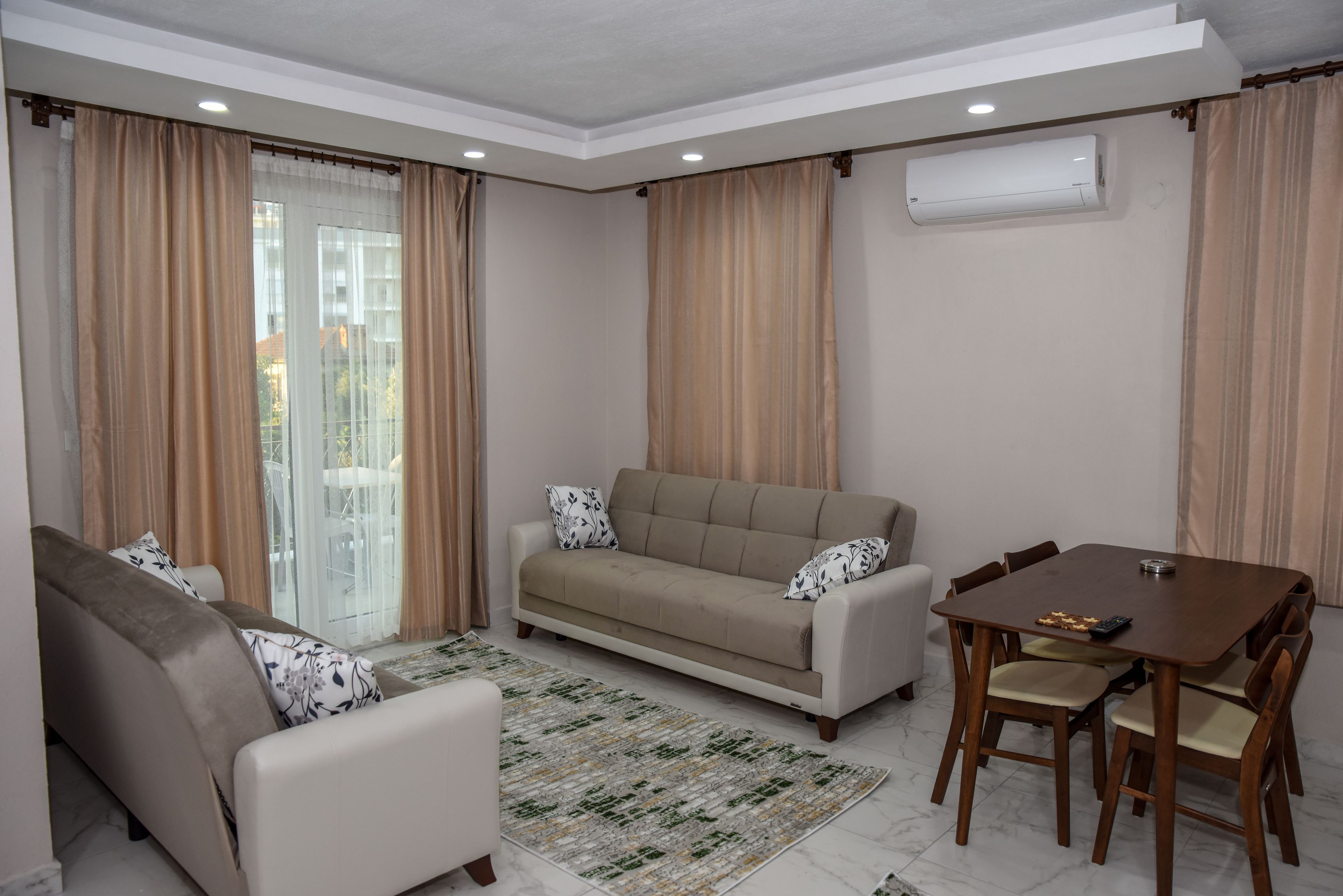 Family Apartment | Living area | 55-inch LED TV with satellite channels, TV