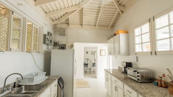 Electric kettle, toaster, cookware/dishes/utensils, dining tables