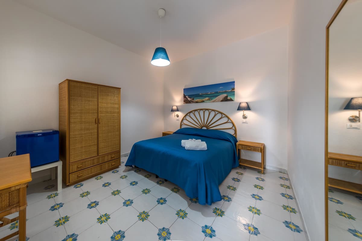 Hypo-allergenic bedding, down duvets, minibar, desk