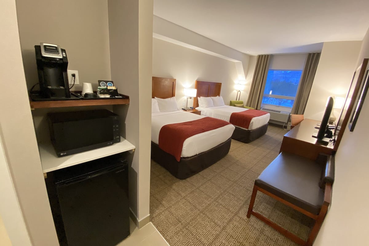 standard room, 2 queen beds, non smoking | 1 bedroom, desk, free wifi, bed sheets