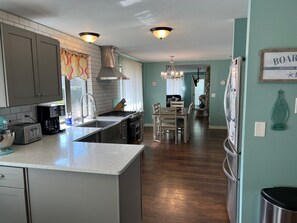 Fridge, oven, dishwasher, coffee/tea maker - Cornerstone Beach House - NEW - Hot Tub, Game Room, Electric Vehicle Charger (Seaside)