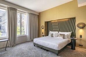 Room, 1 King Bed (Cathedral View) | Free minibar items, in-room safe, individually furnished, desk