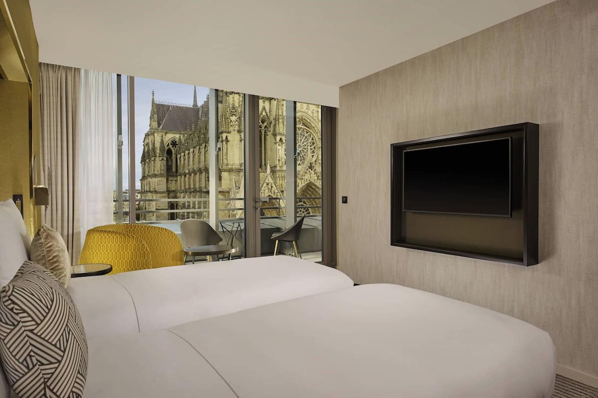 Suite Junior, 2 lits une place, balcon