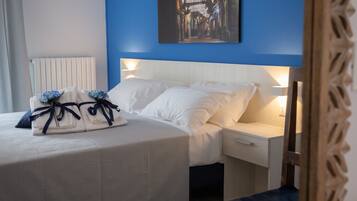 Deluxe-Doppel- oder -Zweibettzimmer, Terrasse | Bettwäsche aus ägyptischer Baumwolle, hochwertige Bettwaren