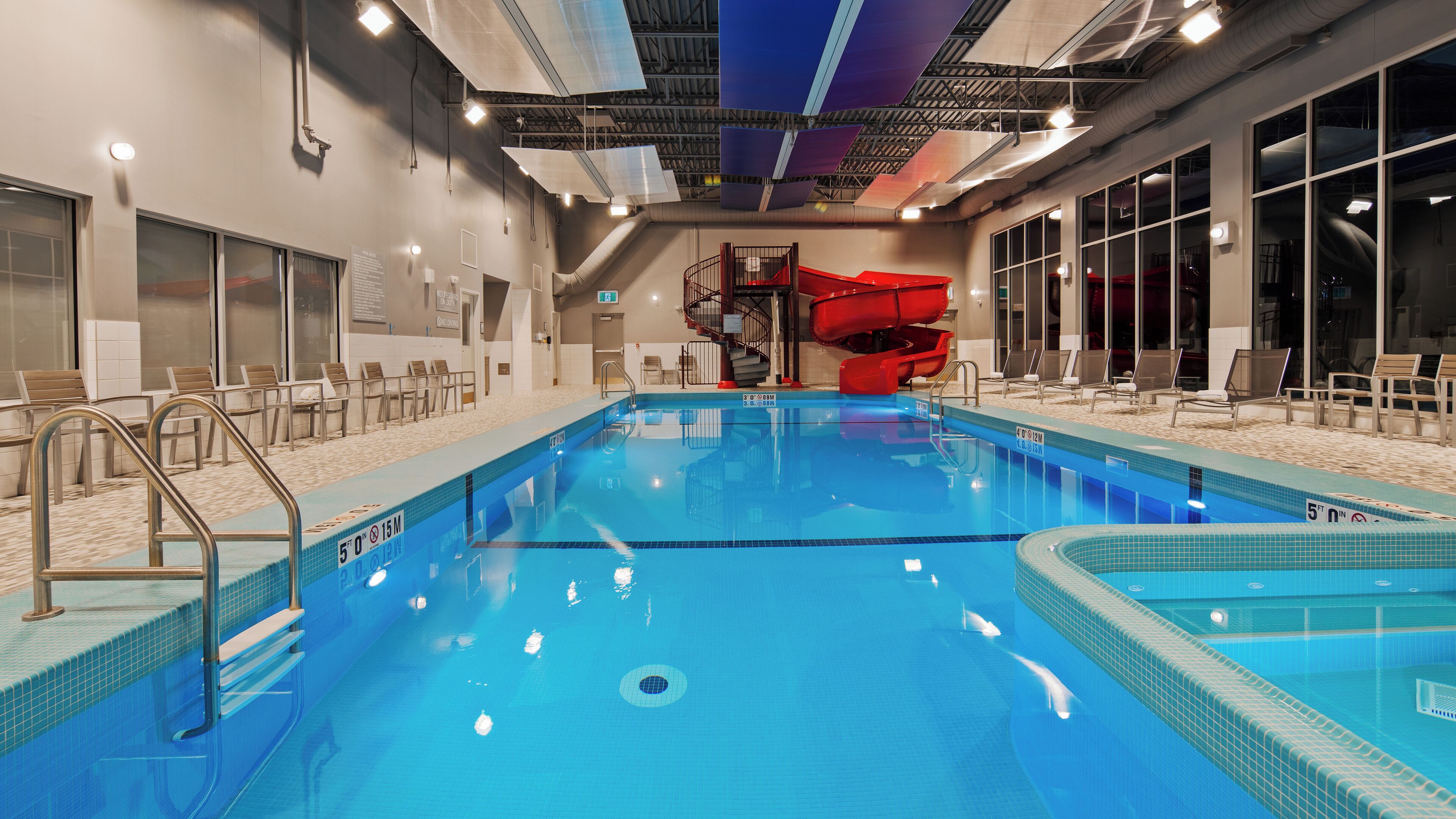 indoor pool, open 9:00 am to 10:00 pm, pool loungers