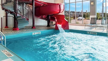 Indoor pool, open 9:00 AM to 10:00 PM, pool loungers