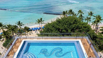 Outdoor pool, open 7:00 AM to 10:00 PM, sun loungers