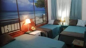 Quadruple Room, Shared Bathroom | Rollaway beds, bed sheets