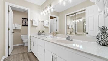 Condo, 2 Bedrooms, Resort View (D205) | Bathroom | Combined shower/bathtub, free toiletries, hair dryer, towels