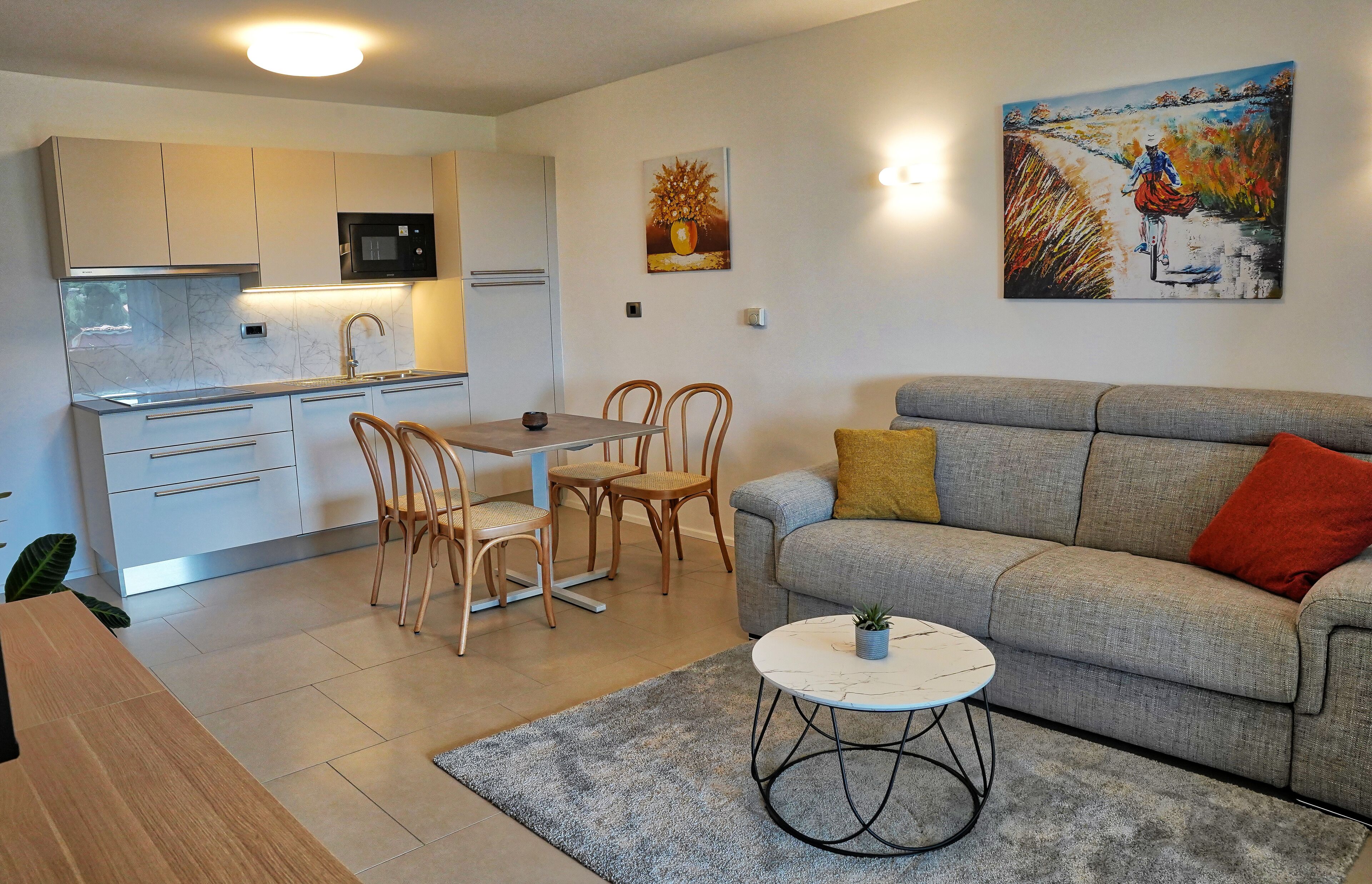 Comfort Apartment, Balcony, Sea View | Living area | Flat-screen TV