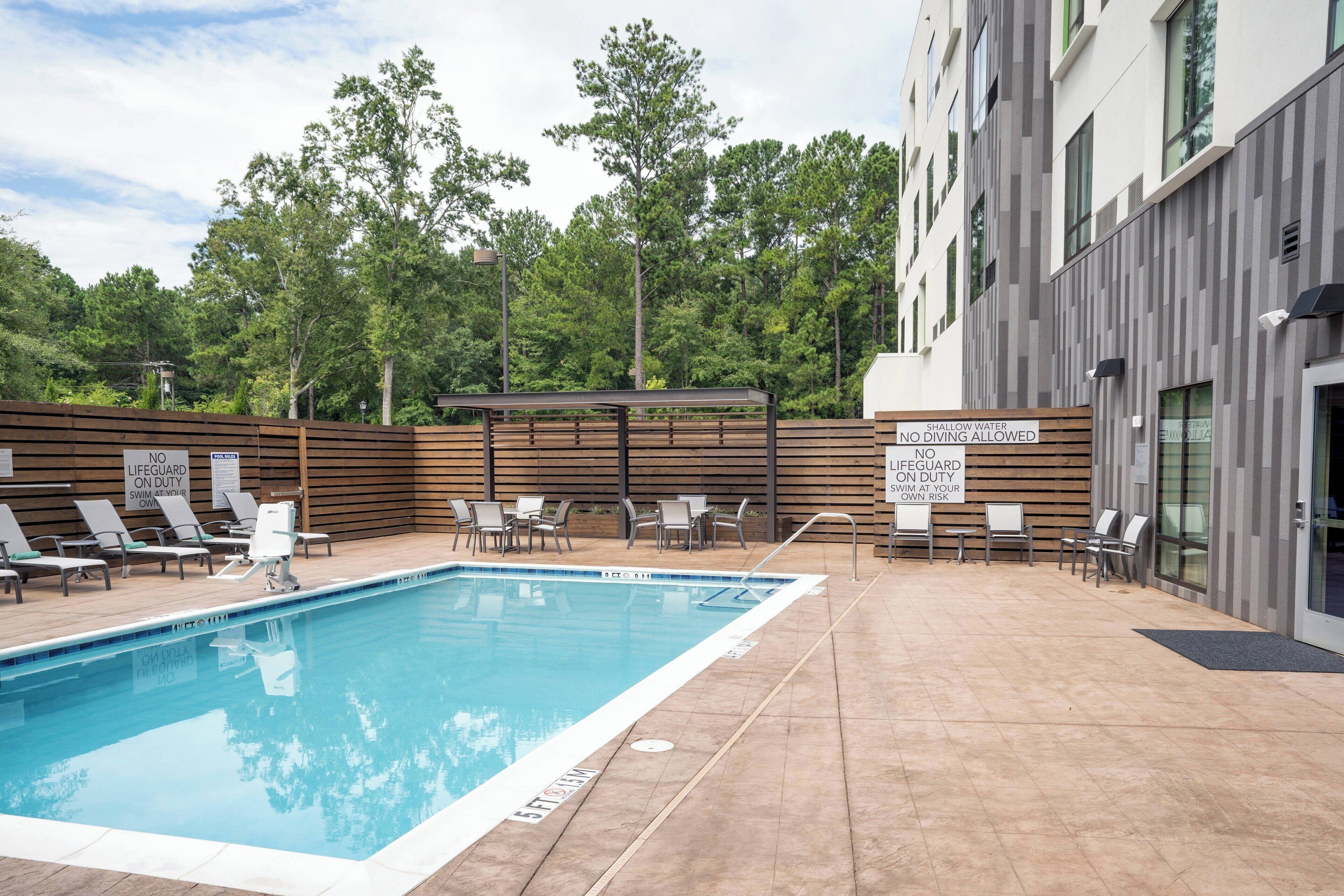 outdoor pool, open 8:00 am to 10:00 pm, pool umbrellas, pool loungers