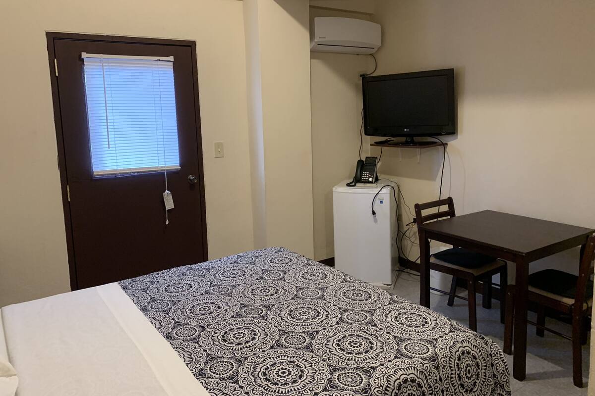 Habitación individual Deluxe | Camas extra y wifi gratis 