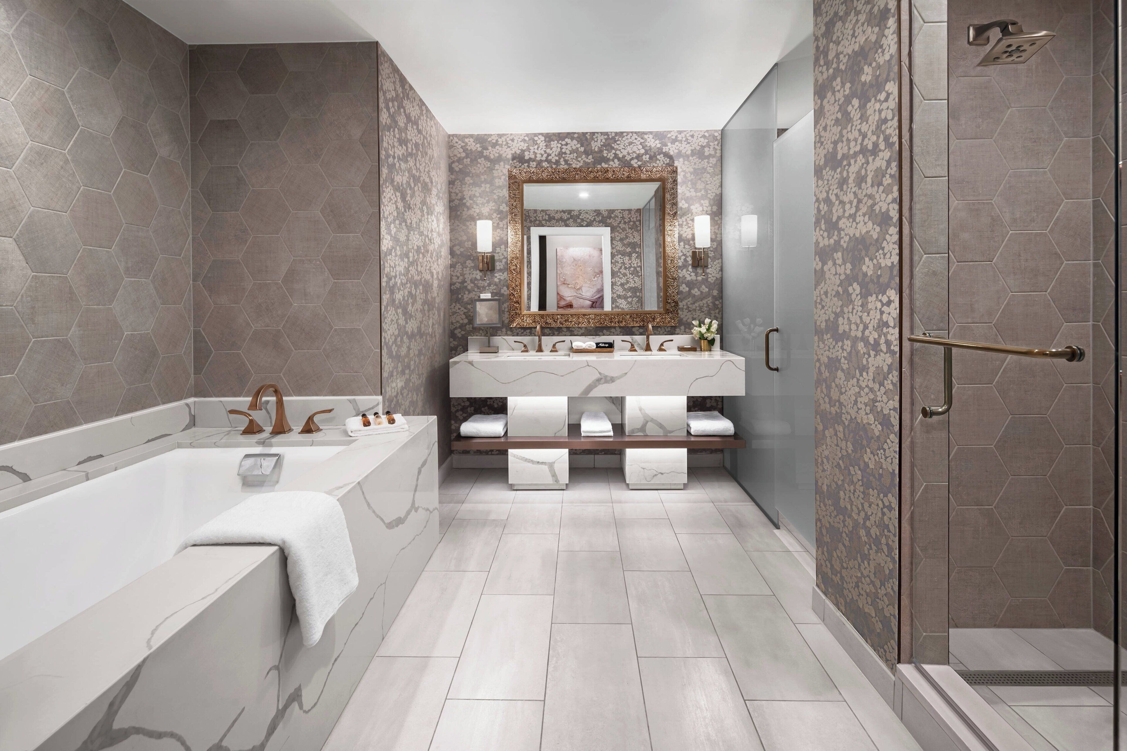 combined shower/bathtub, rainfall showerhead, designer toiletries