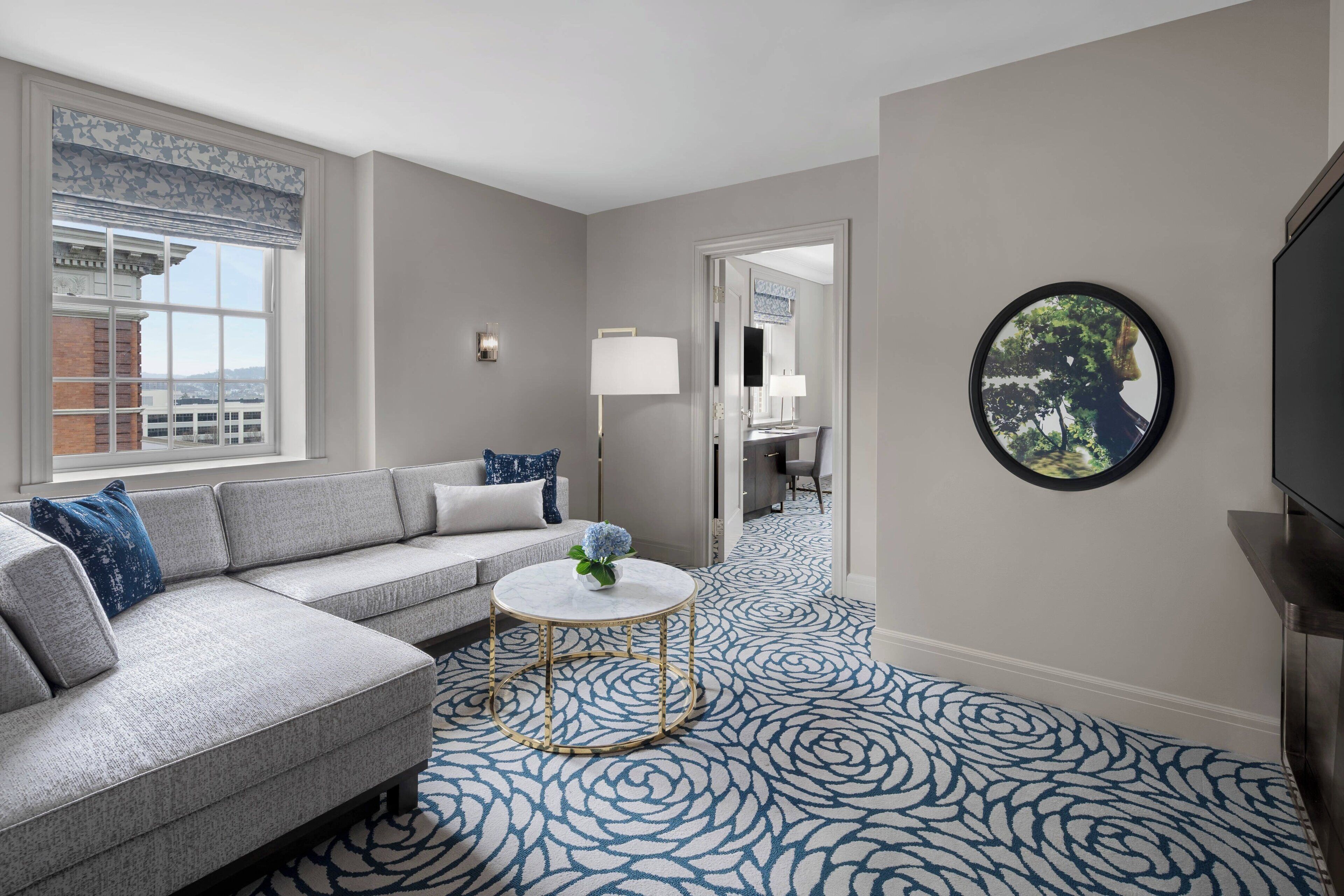 executive suite, 1 king bed, non smoking | living room | 55-inch smart tv with digital channels, tv, tablet