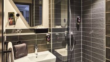 Shower, eco-friendly toiletries, hair dryer, towels