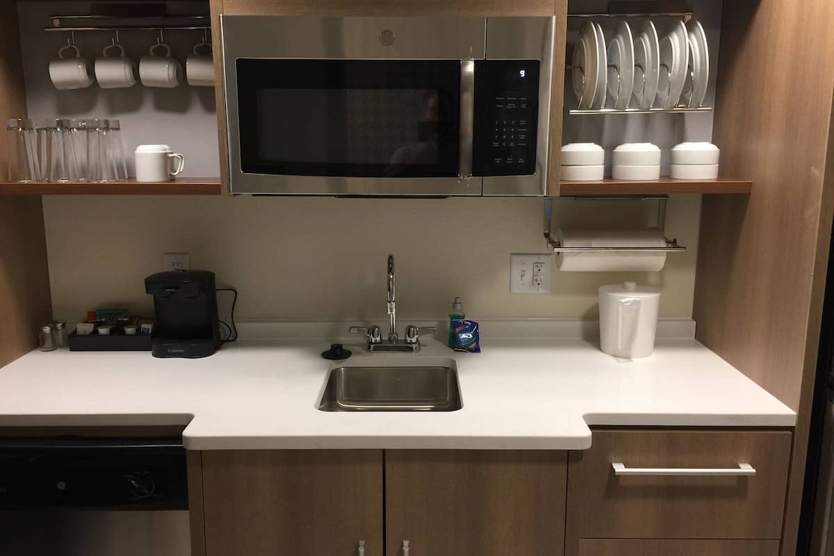 full-sized fridge, microwave, dishwasher, coffee/tea maker