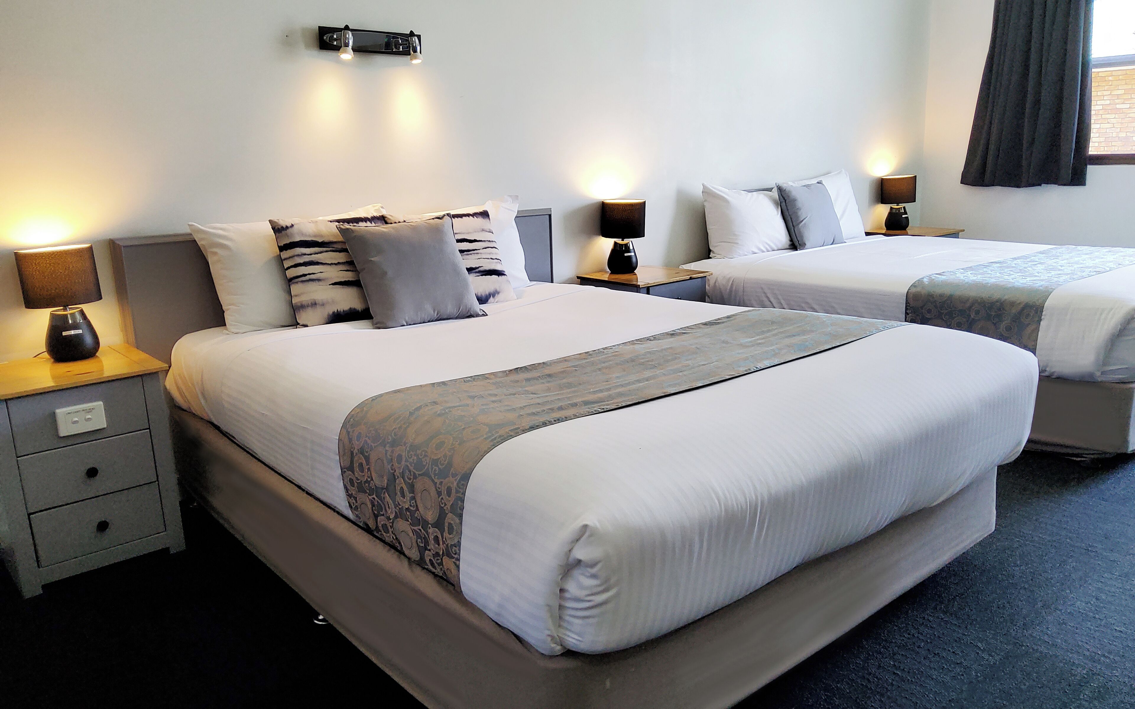 deluxe twin room (non pet) | 1 bedroom, desk, laptop workspace, blackout curtains