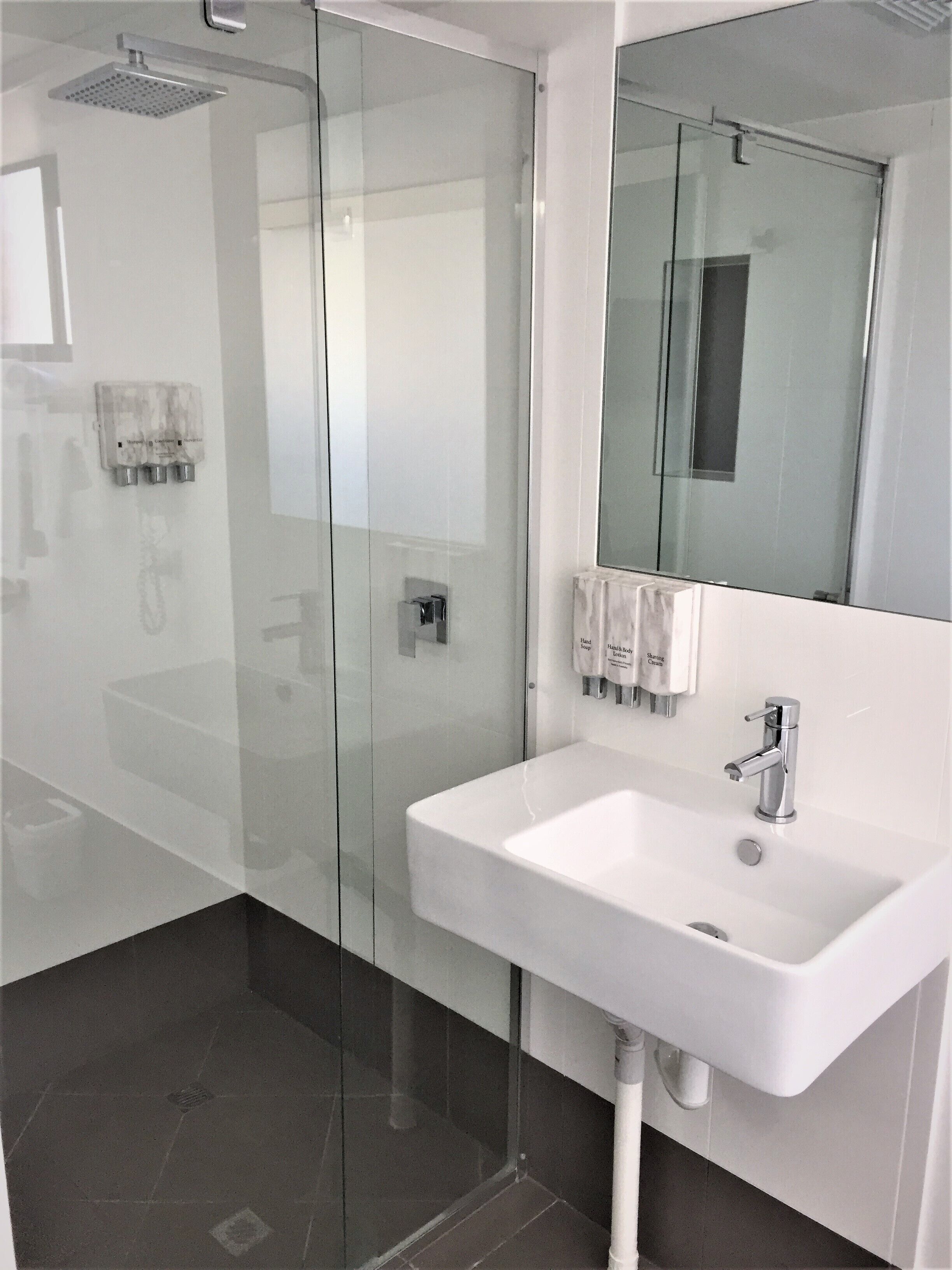 king self contained (non pet) | bathroom | shower, eco-friendly toiletries, hair dryer, towels
